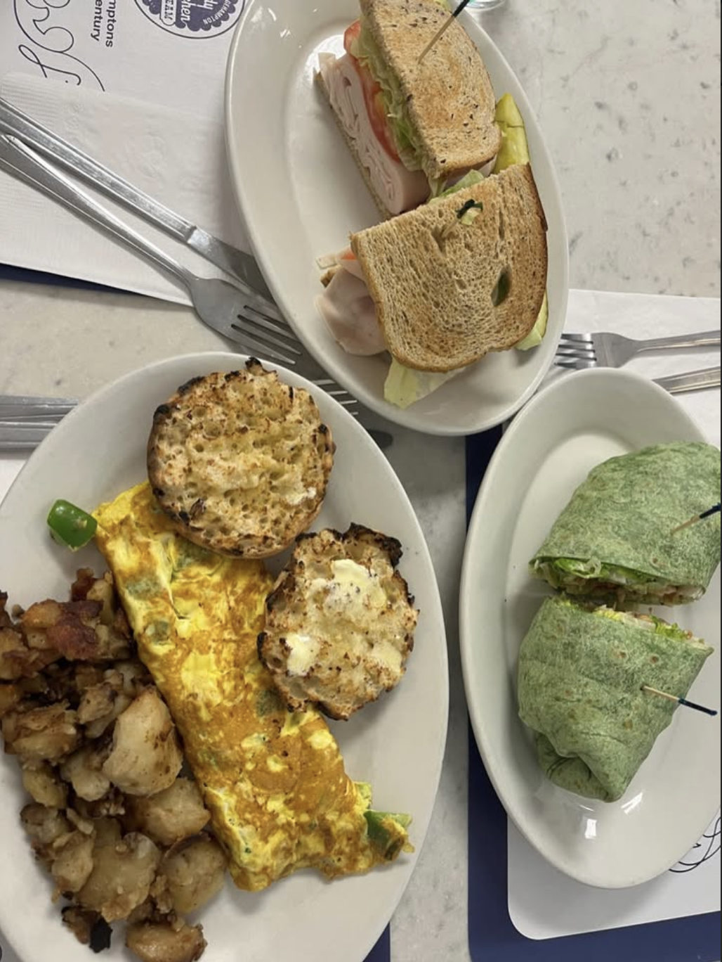 Turkey club, veggie wrap, and Western omelette